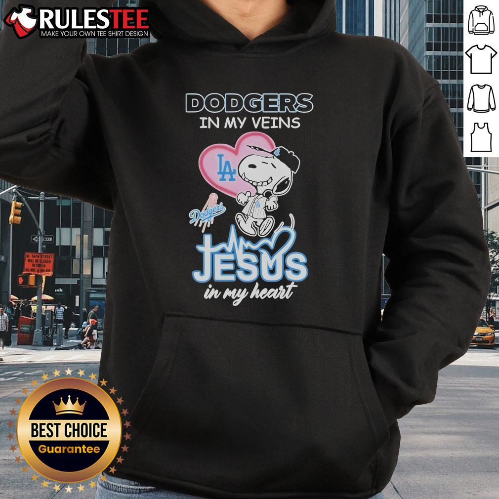 Nice Snoopy The Peanuts Los Angeles Dodgers In My Veins Jesus In My Heart Hoodie Nice Snoopy The Peanuts hoodie with 'Los Angeles Dodgers in my veins, Jesus in my heart' design, perfect for fans.