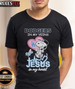 Nice Snoopy The Peanuts Los Angeles Dodgers shirt with 'In My Veins Jesus In My Heart' text, perfect for fans.