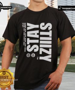Alt Text: Stylish Nice Stiiizy Pursuit Of Excellence T-Shirt displayed on a hanger, perfect for casual streetwear fashion.