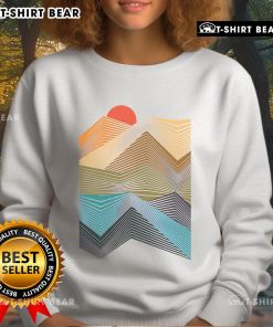 Geometric mountain sunset sweatshirt design featuring vibrant colors and a serene landscape, perfect for outdoor enthusiasts.