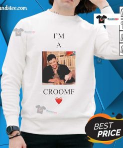 Alt Text: Tom Blyth wearing a stylish 'I'm A Croomf' sweatshirt, showcasing trendy fashion and casual style.