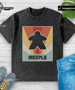 Vintage Meeple board game washed t-shirt featuring colorful game pieces design, perfect for board game enthusiasts.