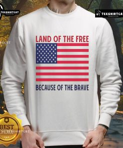 Vivek Ramaswamy wearing a 'Land of the Free Because of the Brave' sweatshirt, showcasing his patriotic style.