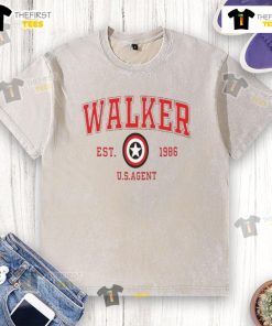 Nice Walker Est 1996 US Agent washed t-shirt featuring a vintage graphic design and soft fabric for casual wear.