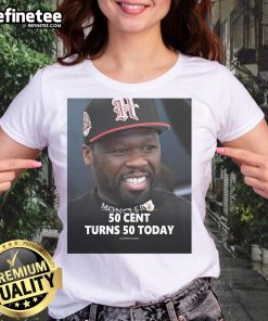 50 Cent celebrates turning 50 today wearing a stylish ladies' tee, showcasing his iconic style and birthday vibes.