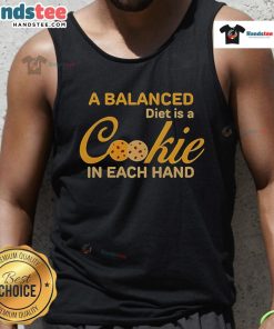 Person wearing 'A Balanced Diet Is A Cookie In Each Hand' tank top, showcasing a fun take on healthy eating habits.