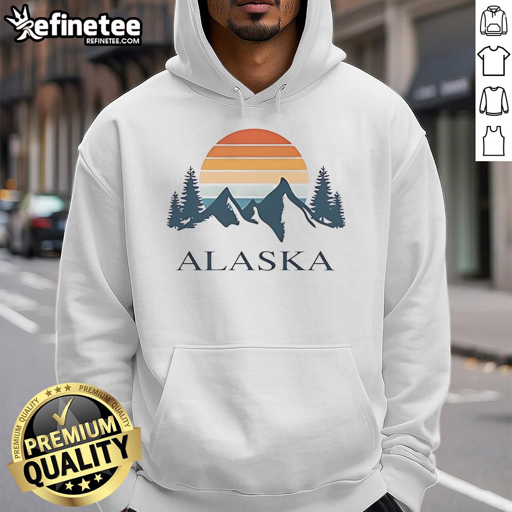 Official Alaska Mountain Camping Adventure Travel Enthusiast Vintage Hoodie Vintage Alaska mountain camping adventure hoodie worn by travel enthusiast in a scenic outdoor setting.
