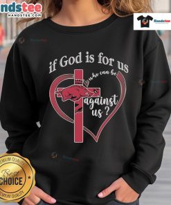 Official Arkansas Razorbacks sweatshirt with 'If God Is For Us, Who Can Be Against Us' slogan, perfect for fans.