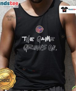 Alt Text: Caitlin Clark wearing an Indiana Fever tank top, showcasing The Game Grows On slogan for sports apparel enthusiasts.
