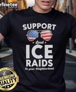 Alt Text: Official Carl Higbie wearing a 'Support Local Ice Raids In Your Neighborhood' T-shirt, promoting community engagement.
