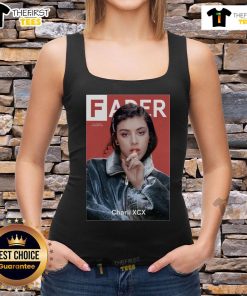 Charli XCX wearing an Official Fader tank top, showcasing a stylish and trendy look perfect for fans and fashion lovers.