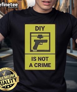 Alt Text: Official DIY Is Not A Crime T-Shirt featuring bold text design, perfect for crafting enthusiasts and advocates.