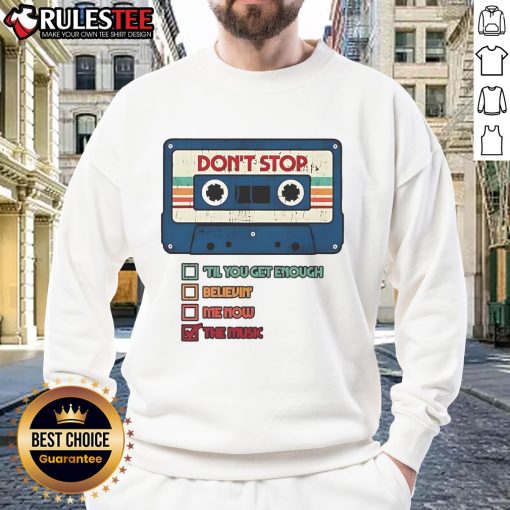 Alt Text: Official 'Don't Stop The Music' cassette tape graphic on a retro vintage sweatshirt, perfect for music lovers.