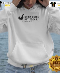 Cozy Key West hoodie featuring 'Official Drink Coffee Pet Cocks Wine Line' design, perfect for coffee and wine lovers.