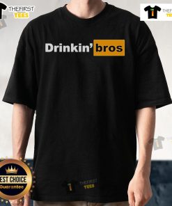 Alt Text: Official Drinkin' Bros Pornhub Logo T-Shirt featuring a bold logo design on a black cotton fabric.