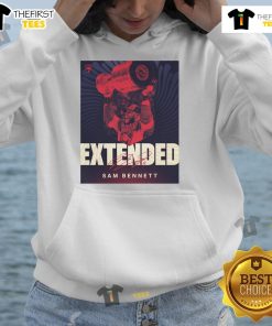 Sam Bennett signs his eight-year contract extension with the Florida Panthers, wearing an official team hoodie.