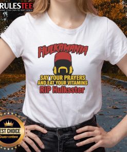 Official Hulkamania 'Say Your Prayers And Eat Your Vitamins' tee featuring Hulkster design for ladies. Celebrate wrestling legacy.