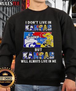 Official I Don't Live In Kansas But Kansas Will Always Live In Me sweatshirt for sports fans, showcasing team pride.