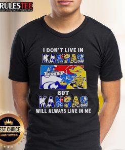 Official 'I Don't Live In Kansas But Kansas Will Always Live In Me' sports teams t-shirt, perfect for Kansas fans.