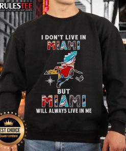 Official I Don't Live In Miami But Miami Will Always Live In Me sweatshirt featuring vibrant sport teams graphics.