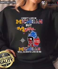 Cozy 'I Don't Live in Michigan But Michigan Will Always Live in Me' sweatshirt, perfect for proud Michigan residents.