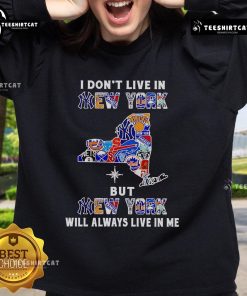 Official 'I Don't Live in New York But New York Will Always Live in Me' sweatshirt showcasing sports team pride.