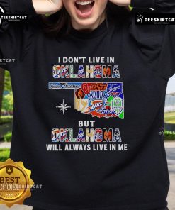 Official 'I Dont Live in Oklahoma but Oklahoma Will Always Live in Me' sweatshirt featuring sport teams logo and design.