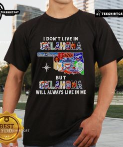 Alt Text: Official I Don'T Live In Oklahoma But Oklahoma Will Always Live In Me Sport Teams T-Shirt design featuring vibrant graphics.