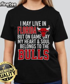 Alt Text: Official I May Live In Florida But On Game Day My Heart And Soul Belongs To The Bulls Ladies Tee in vibrant colors.