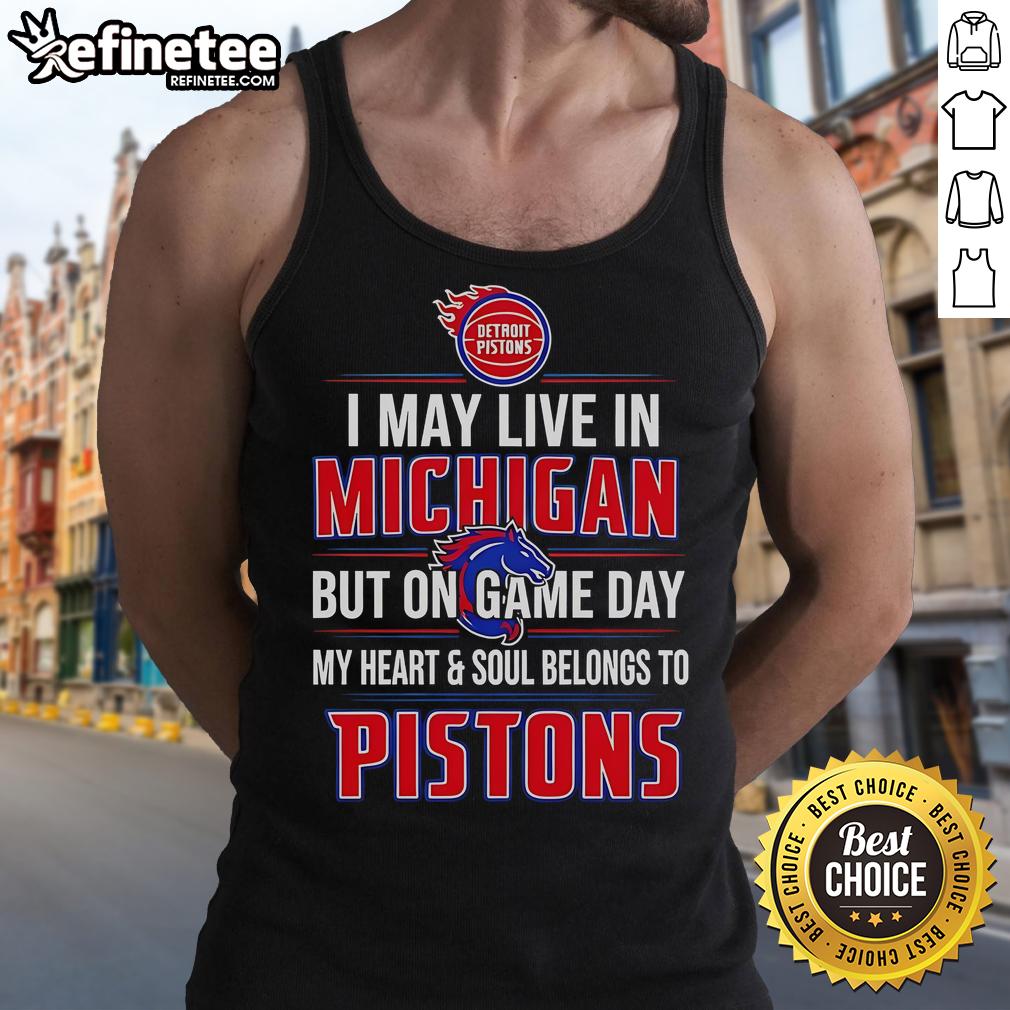 Official I May Live In Michigan But On Game Day My Heart And Soul Belongs To The Detroit Pistons Tank Top Alt Text: Detroit Pistons tank top celebrating Michigan pride on game day with bold graphics and team colors.