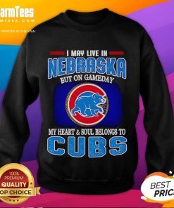 Cozy sweatshirt featuring 'I May Live In Nebraska But On Gameday My Heart And Soul Belongs To Chicago Cubs' design.