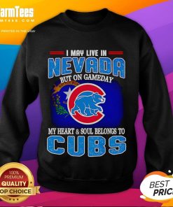 Alt Text: Chicago Cubs sweatshirt displaying pride for the team while living in Nevada on game day.