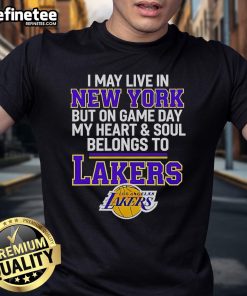 Official I May Live In New York But On Game Day My Heart & Soul Belongs To Lakers T-Shirt displayed on a hanger.