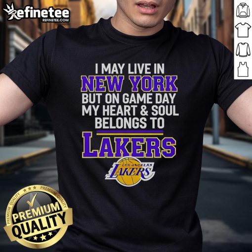 Official I May Live In New York But On Game Day My Heart & Soul Belongs To Lakers T-Shirt displayed on a hanger.