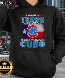 Texas fan wearing Chicago Cubs hoodie, showcasing team spirit on gameday with a vibrant design and logo.