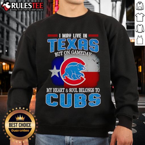 Official I May Live In Texas But On Gameday My Heart And Soul Belongs To Chicago Cubs Sweatshirt displayed on a hanger.