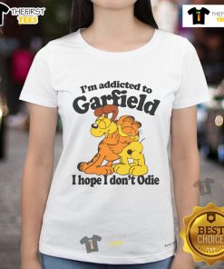 Official 'I'm Addicted to Orange Cats' ladies tee featuring a playful design with a cute orange cat illustration.