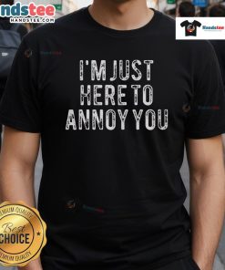 Alt Text: Official I'M Just Here To Annoy You T-Shirt featuring a bold graphic design, perfect for humor and casual wear.