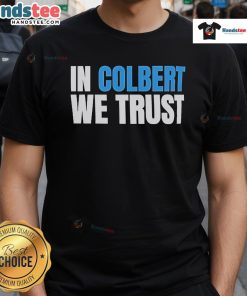 Official In Colbert We Trust T-Shirt featuring bold lettering on a stylish black fabric for fans of Stephen Colbert.