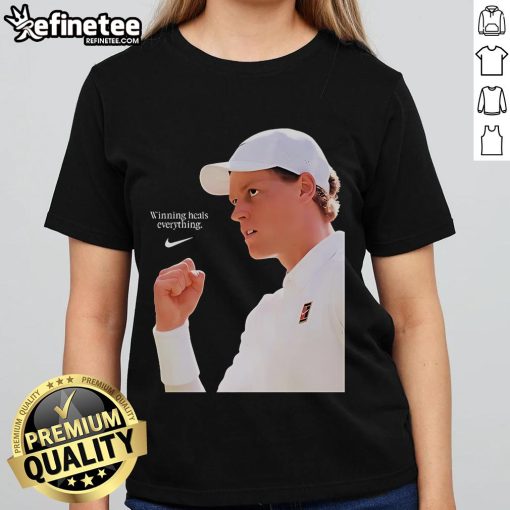 Jannik Sinner winning Nike x Wimbledon 2025 Champions tee for ladies, celebrating victory on the grass court.