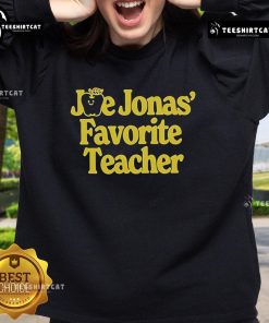 Joe Jonas wearing his favorite teacher sweatshirt, showcasing a stylish and casual look for fans and educators alike.
