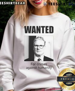 Official Keir Starmer Wanted for Crimes Against Humanity sweatshirt design featuring bold text and striking graphics.