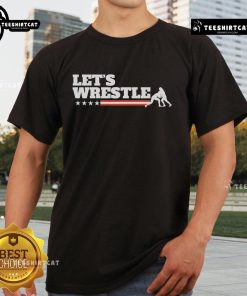Official Let's Wrestle USA T-Shirt featuring bold graphics and vibrant colors, perfect for wrestling fans and enthusiasts.