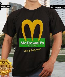Alt Text: Official McDowell's Restaurant 'Home of the Big Mick' logo t-shirt featuring bold graphics and vibrant colors.