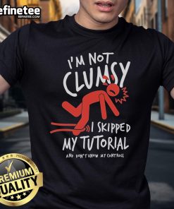 Alt Text: Official Metro Mike I'm Not Clumsy I Skipped My Tutorial and Don't Know My Controls T-Shirt design featuring playful graphics.