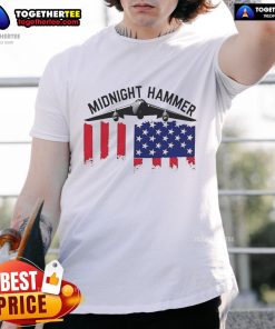 Official Midnight Hammer USA Flag T-Shirt featuring a bold American flag design on a stylish, comfortable tee.