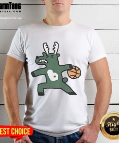Official Milwaukee Bucks NBA basketball dribbling T-shirt featuring vibrant team colors and logo for fans and players.