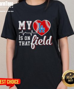 Alt Text: Official My Heart Is On That Field baseball tee for ladies featuring Los Angeles Dodgers logo and design.