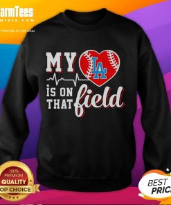 Los Angeles Dodgers sweatshirt with 'My Heart Is On That Field' design, perfect for baseball fans and game day attire.