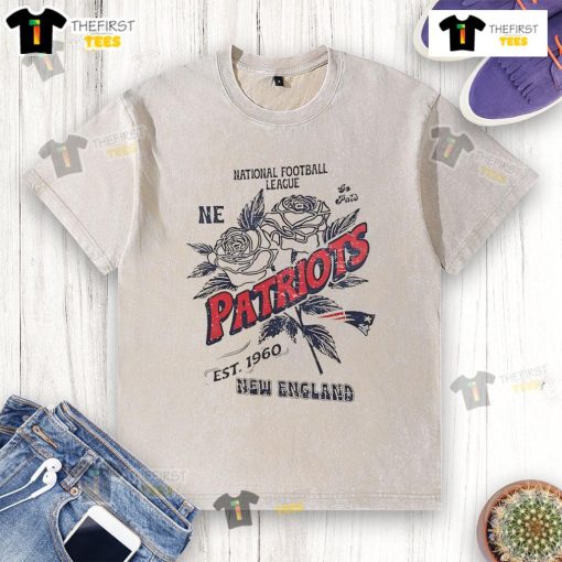 Official New England Patriots washed t-shirt, featuring NFL logo, established 1960, perfect for fans and casual wear.